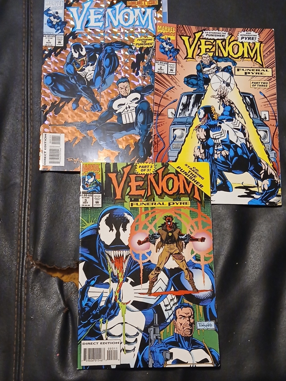 Marvel Venom Comic Covers in Blue, Black, Orange, Green